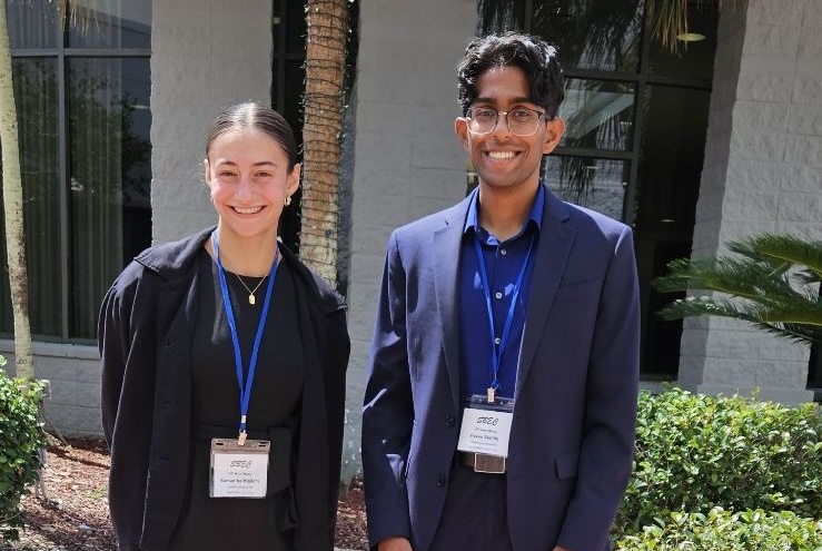 Two Student Scholars present at a research conference